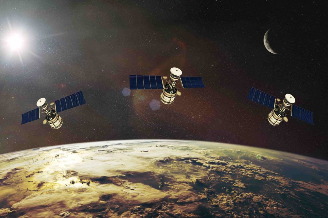 low earth orbit satellites in space over the earth